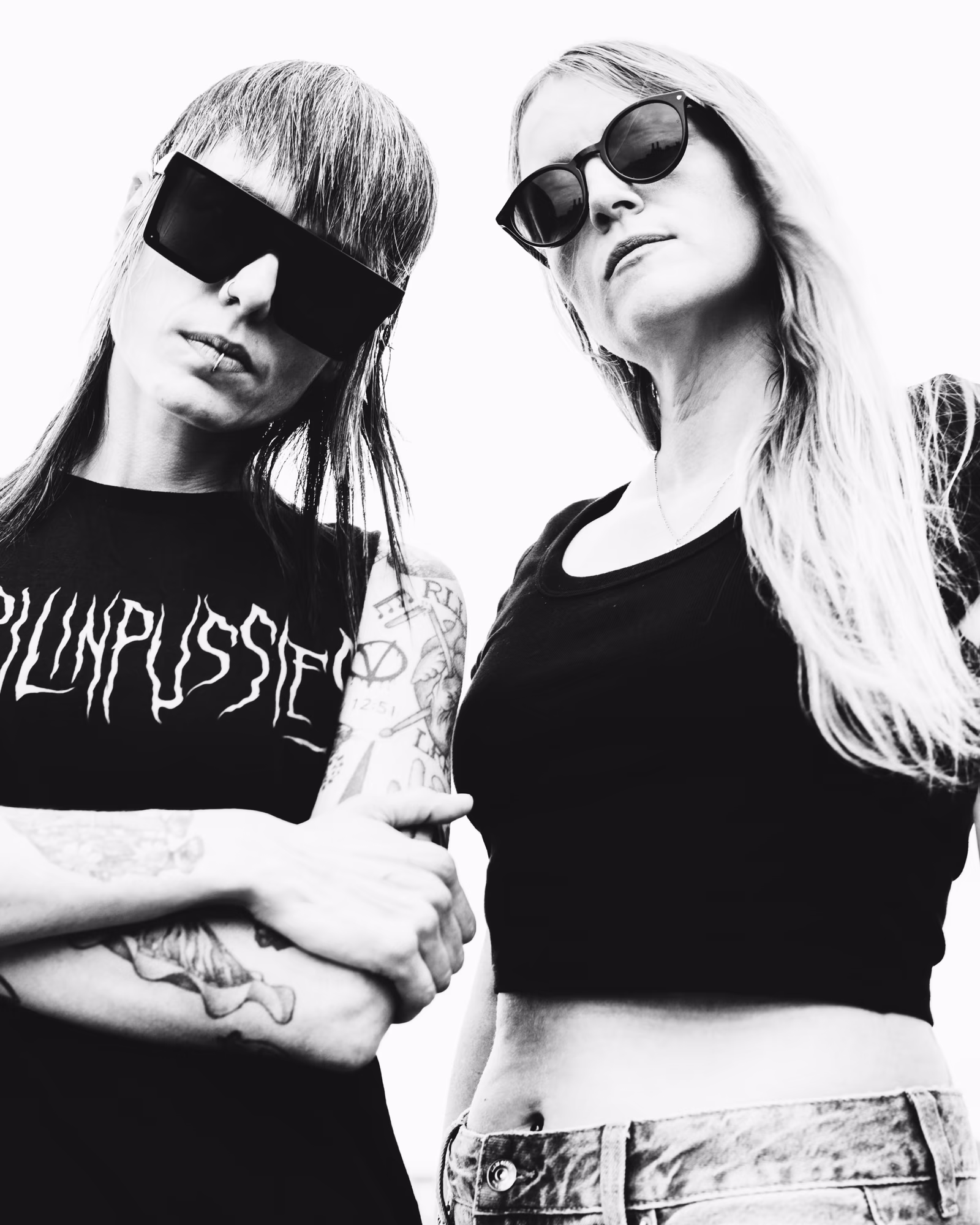 Anx and V of Bala in sunglasses, in black and white